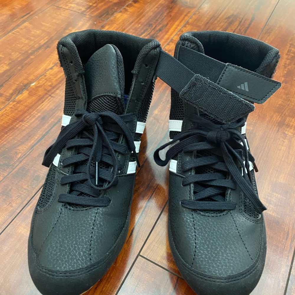 Adidas women’s Black High-Top wrestling shoes.